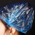 山头林村一次性浴帽塑料PE头套防水防油烟透明条帽洗澡淋浴100只装 蓝色款100只拉直42cm