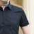 卡帝乐鳄鱼(CARTELO)衬衫男 纯色休闲短袖衬衫舒适透气白衬衣男 1F158101312D 黑色-短袖 3XL