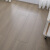 匠视界12mm金属漆灰色凹凸浮雕面深色木纹环保耐磨设计师强化复合木地板 AQ1253 平米