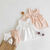 雅浪姿夏季婴儿套装6-12个月女孩薄款棉质无袖木耳边上衣+灯笼面包裤女 米白(两件套) 90cm