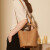 COLATEA 蔻拉缇水桶包女2023新款大容量真皮通勤女包品牌简约百搭手提斜挎包包 棕色