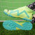 彪马（Puma）足球鞋男鞋 2024春季新款透气耐磨轻便训练运动鞋 实战比赛钉鞋 107178-03/黄色-薄荷绿 40.5码(内长260mm)