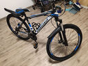 金武端自行车成人山地车公路赛车单车骑行变速超轻越野中学生初中青少年 旗舰版-辐条轮-黑蓝色 27.5寸30速 实拍图