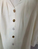 百图betu女装春夏新款衬衫圆领不规则纽扣七分袖衬衫女2403T39 米白 XS 实拍图